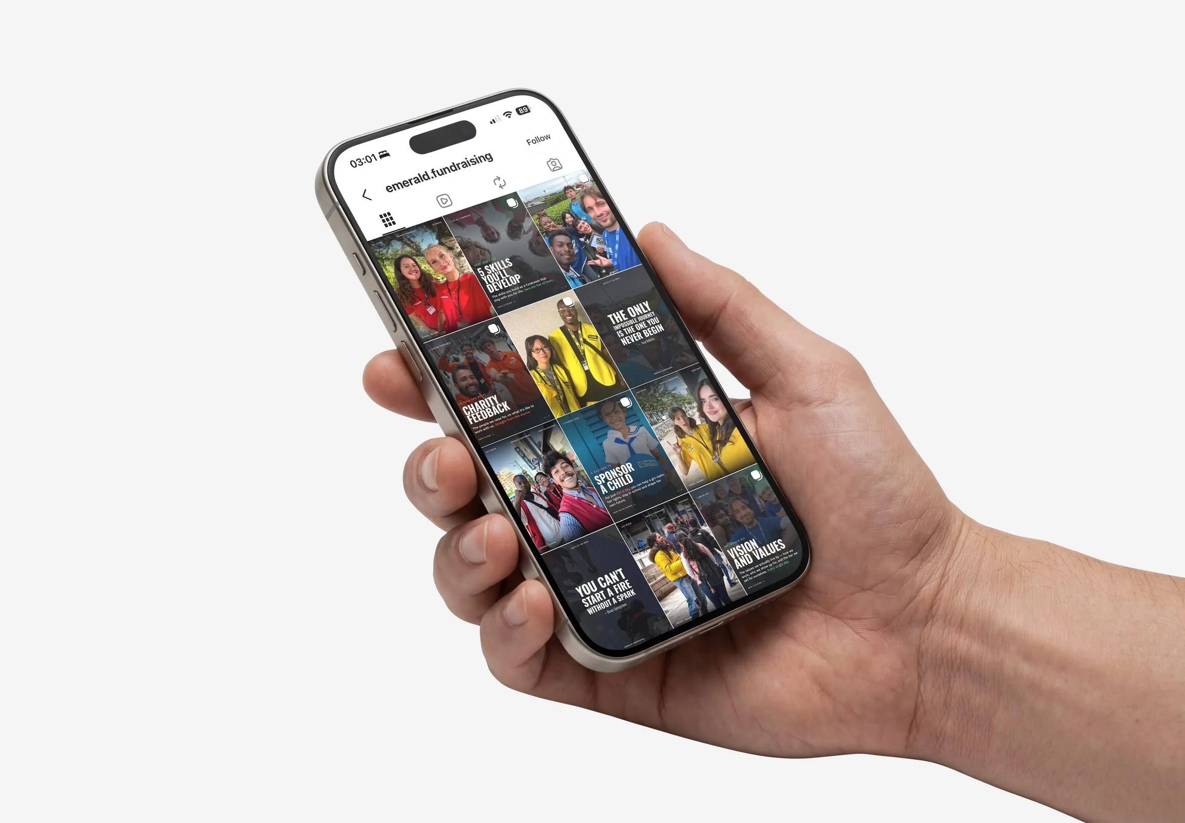 Hand holding a phone showing the Emerald Fundraising Instagram grid
