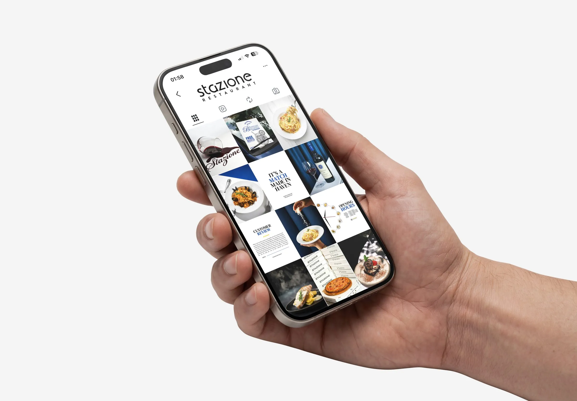 Hand holding a phone showing the Stazione Restaurant Instagram grid
